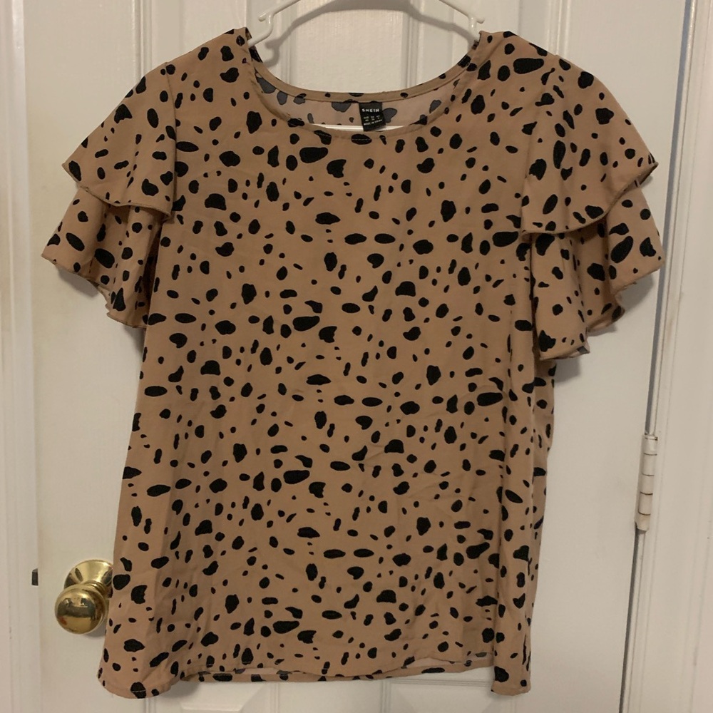Woman’s ruffle sleeve blouse